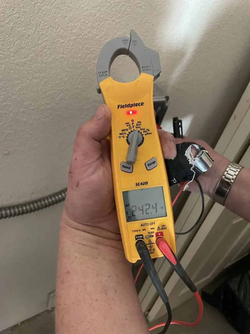 Voltage testing with clamp meter during Aluminum Wiring Replacement in Falmouth